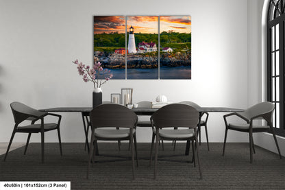 a dining room table with chairs and a painting on the wall