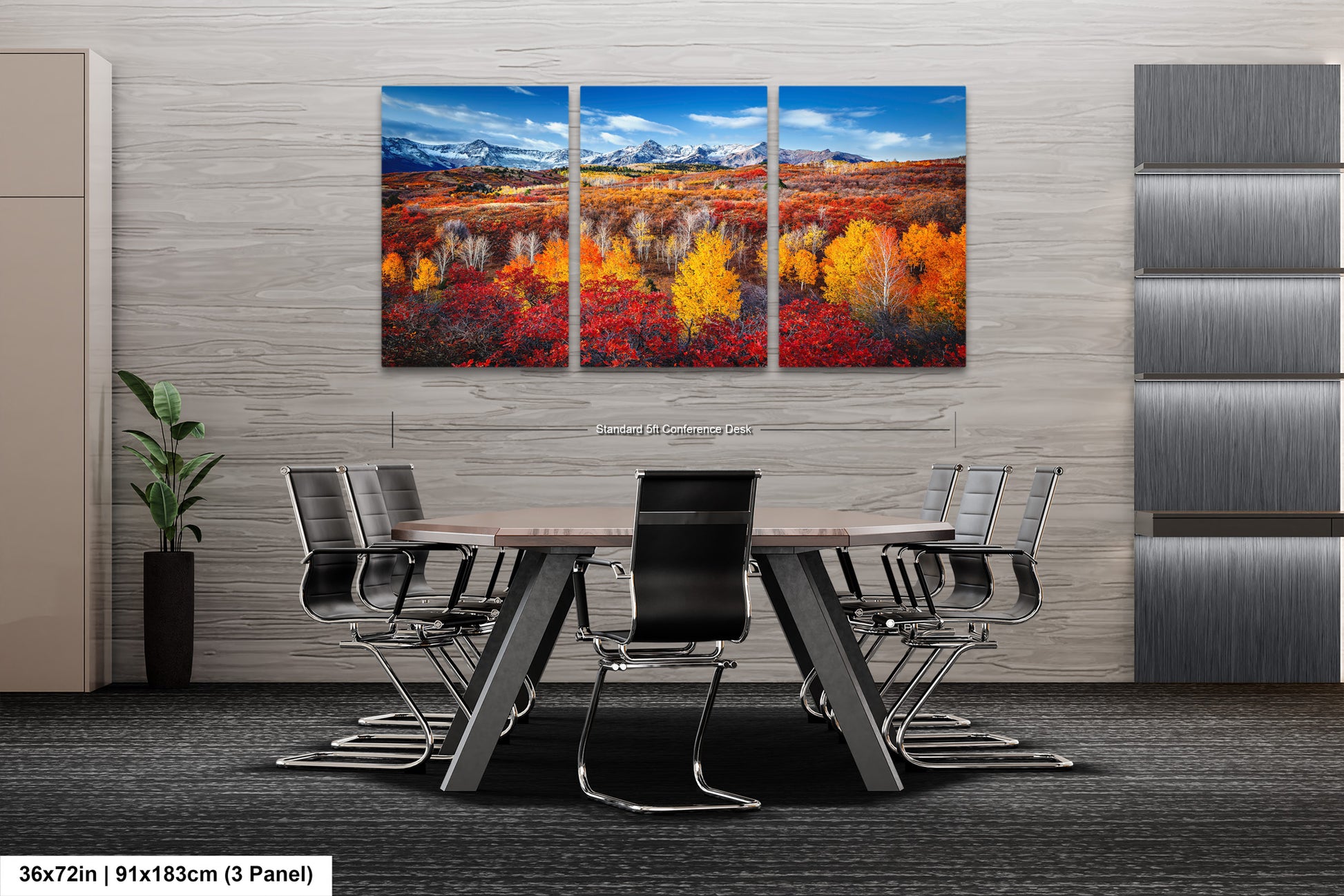 a dining room table with chairs and a painting on the wall