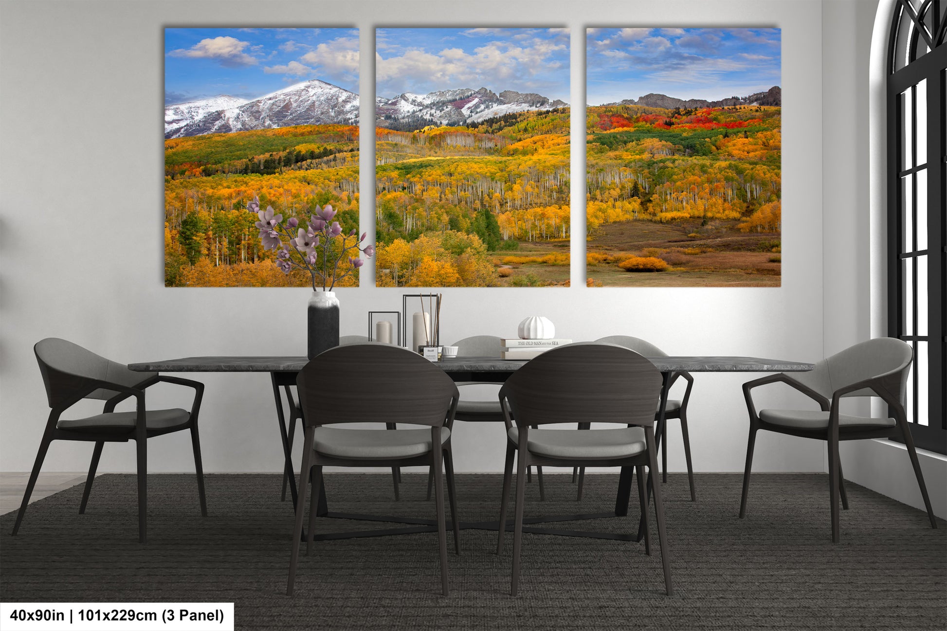 a dining room with a table and four chairs