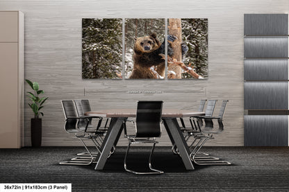 a dining room table with chairs and a picture of a bear