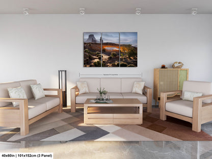 a living room filled with furniture and a painting on the wall