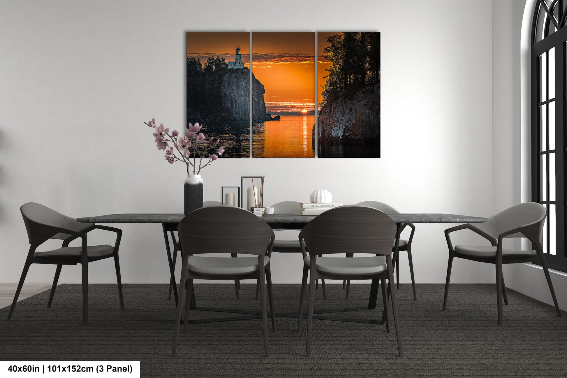 a dining room with a table and chairs