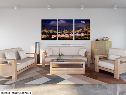 a living room filled with furniture and a painting on the wall