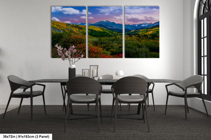 a dining room with a table and chairs