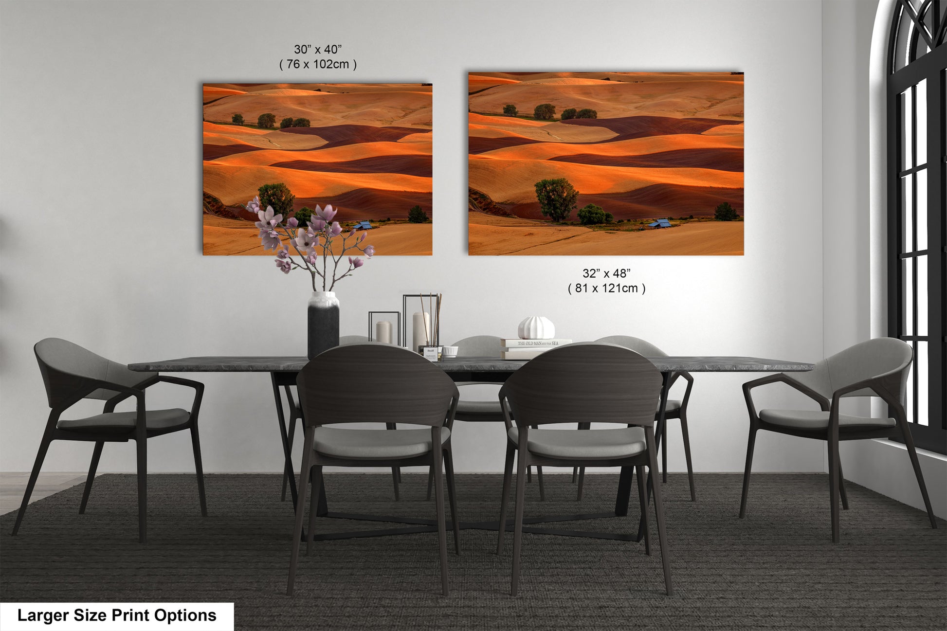 a dining room table with chairs and a vase of flowers
