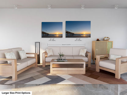 a living room filled with furniture and a painting on the wall