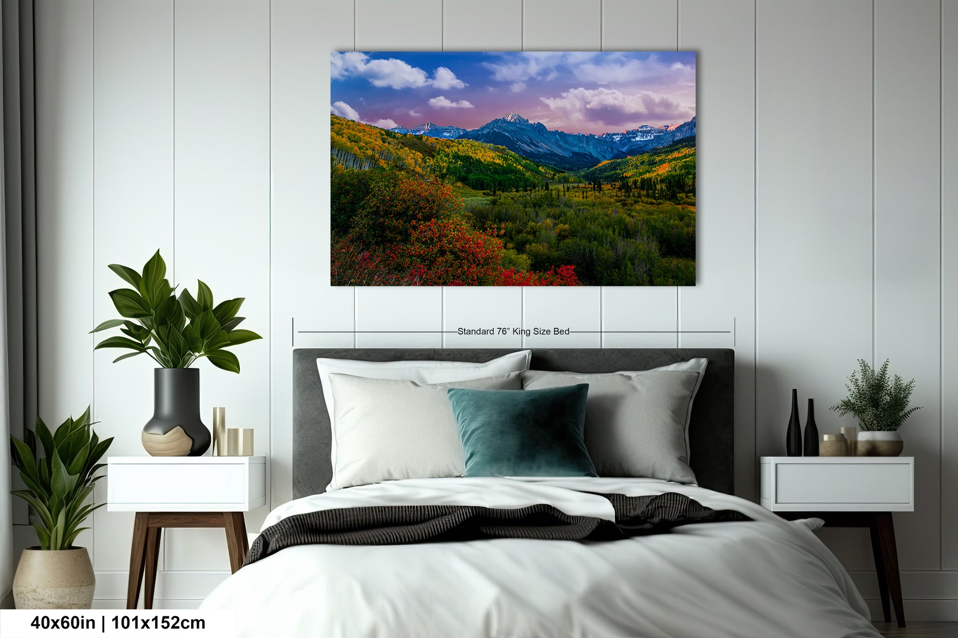 a bedroom with a bed and a painting on the wall