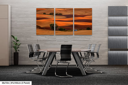 a dining room with a table and chairs
