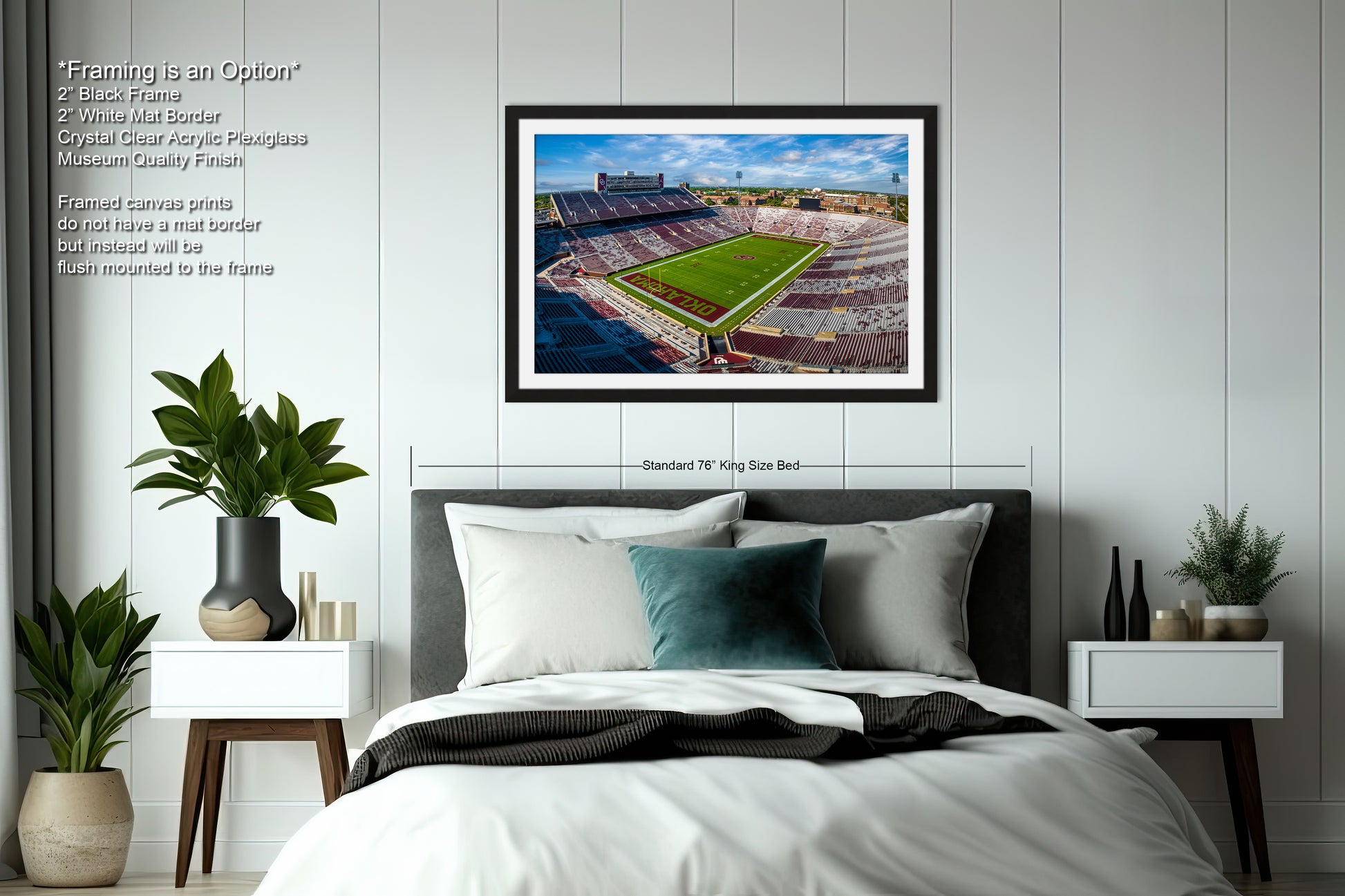 a bedroom with a large bed and a picture on the wall