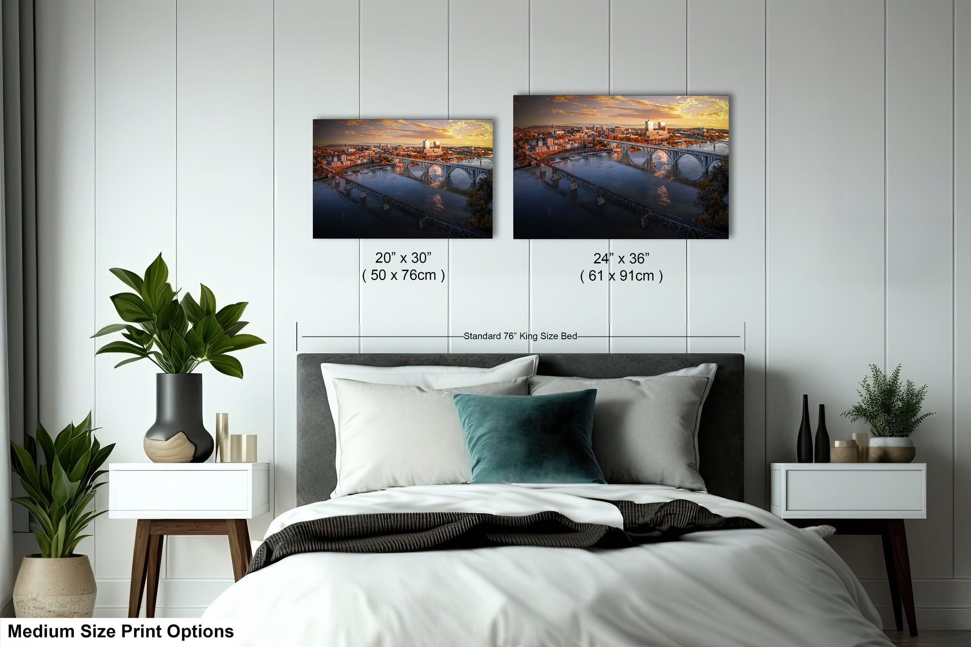 a bedroom with a bed and two pictures on the wall