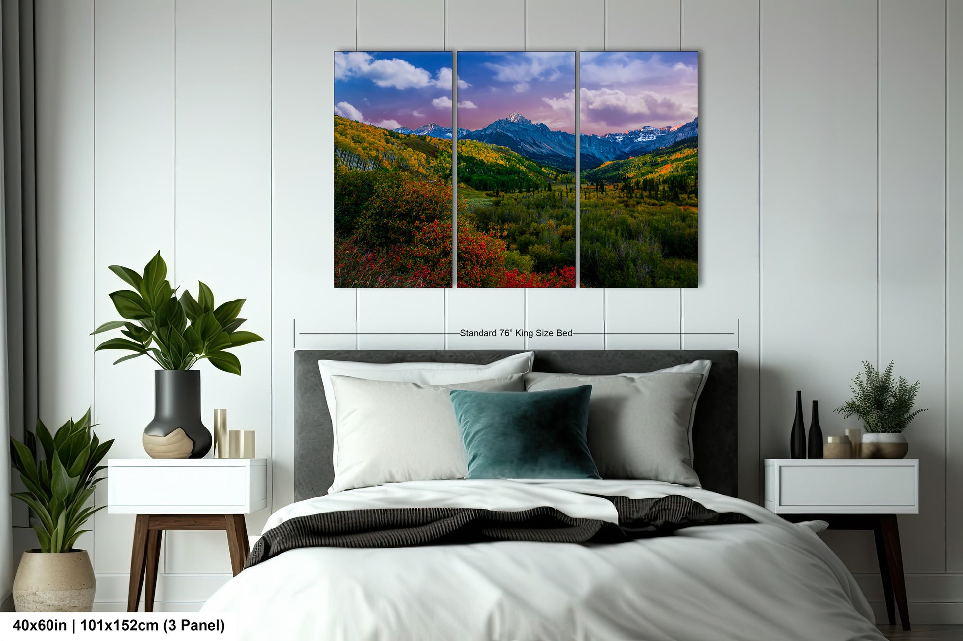 a bed room with a neatly made bed and a painting on the wall