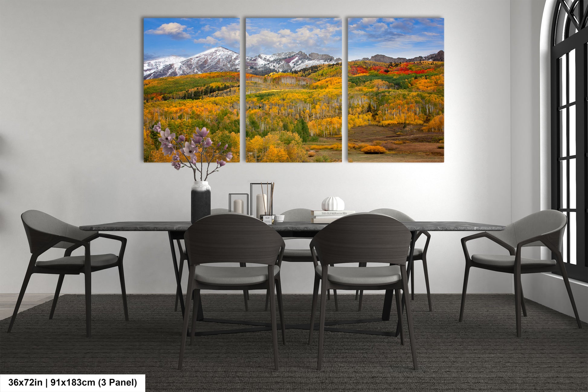 a dining room with a table and chairs
