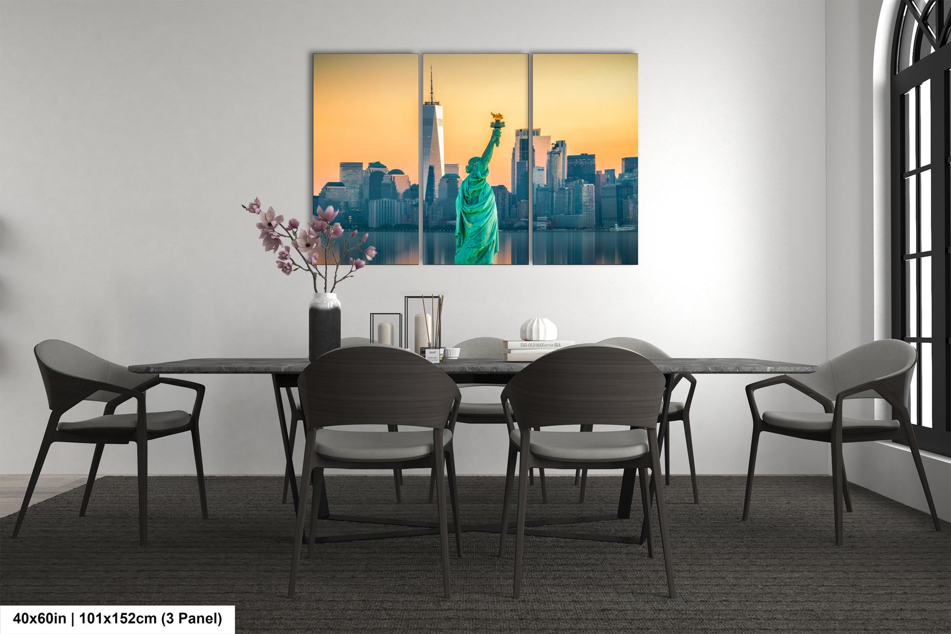a dining room table with a statue of liberty in the background