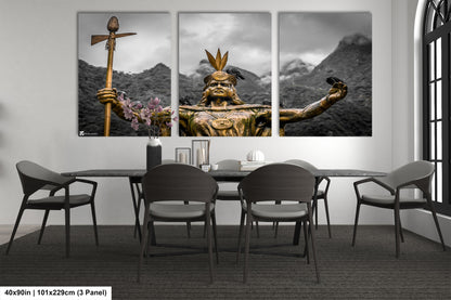 a dining room table with chairs and paintings on the wall