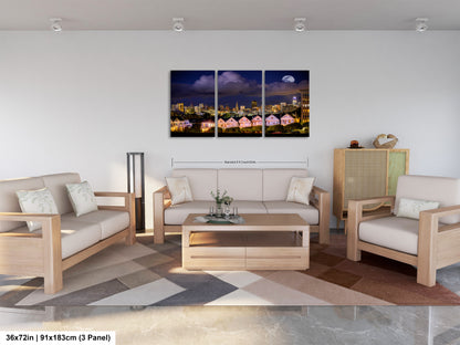 a living room filled with furniture and a painting on the wall