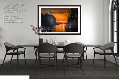 a picture of a dining room with a table and chairs