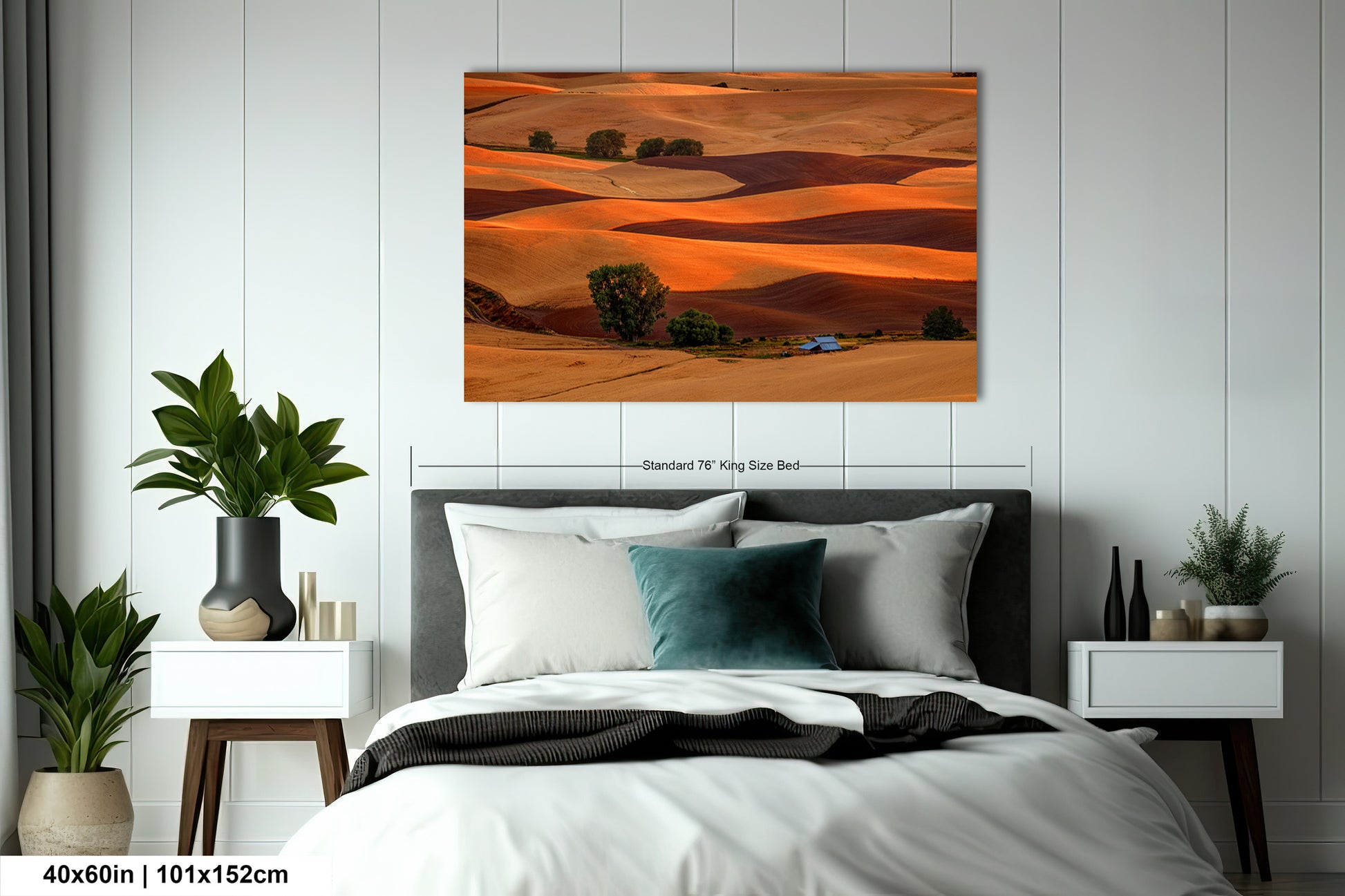 a bed room with a neatly made bed and a painting on the wall