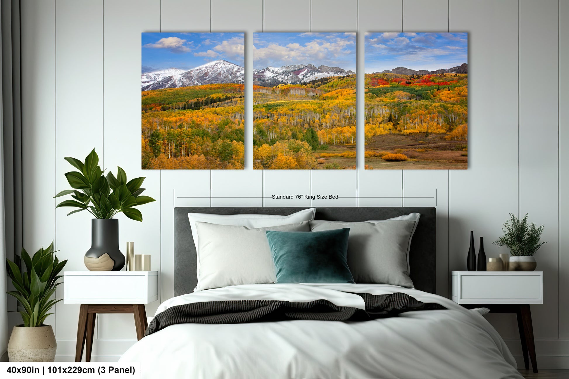 a bed room with a neatly made bed and two pictures on the wall