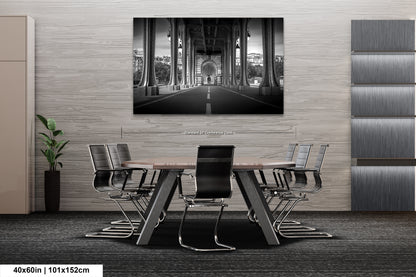 a black and white photo of a table and chairs