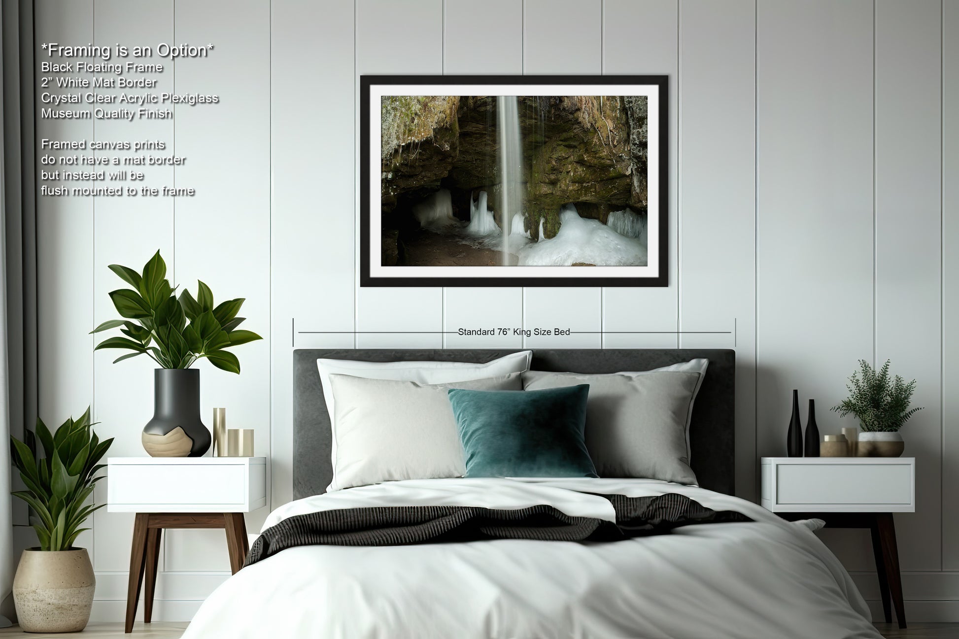 a bedroom with a bed and a picture hanging on the wall