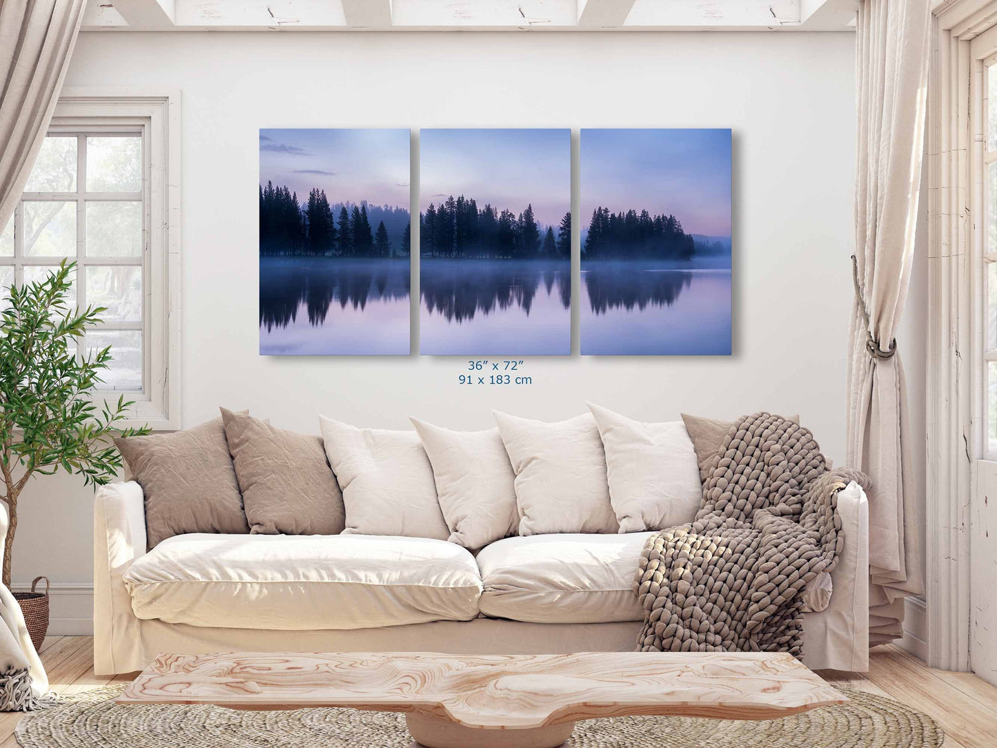 Oversized three-panel wall art, each 36x72, featuring Yellowstone Lakes twilight reflection, creating a dramatic visual impact in a spacious living room.