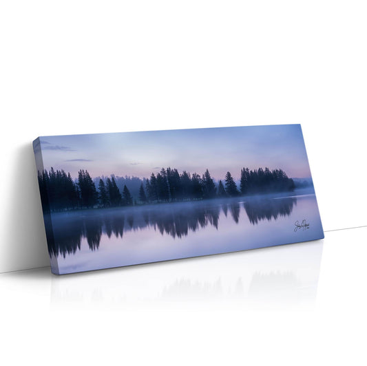 An explainer image comparing gallery-wrapped canvas, premium photo paper, and metal print mediums of a photograph Yellowstone Lake reflection at twilight.